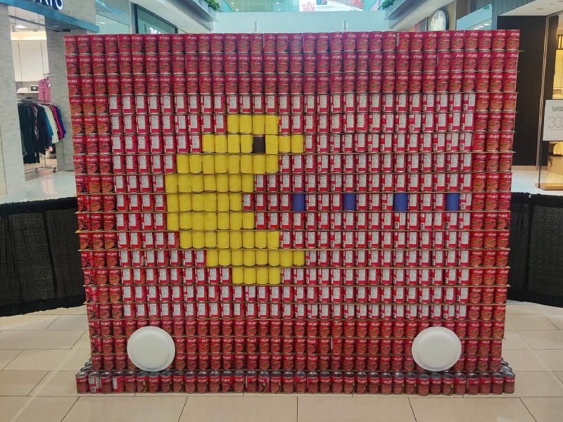 Pac man image made out of cans
